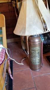 lot 1371 image: Antique copper fire extinguisher lamp (shade torn) approx 38 tall