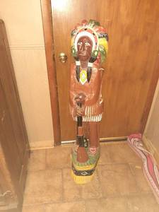 lot 1405 image: Native American wooden statue. Approximately 47 tall. Made by Ivan Crane