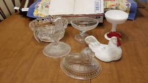 lot 1517 image: Westmoreland stemmed dish and chicken, rooster & lion top and 2 glass dishes