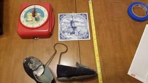 lot 1528 image: Vintage Dutch clock, Comfy cloth shoes and Delft windmill trivet