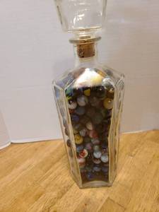 lot 1603 image: Marbles in liquor decanter 12 tall