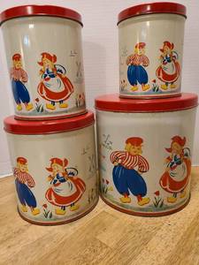 lot 1615 image: Vintage tin cannister set Dutch theme