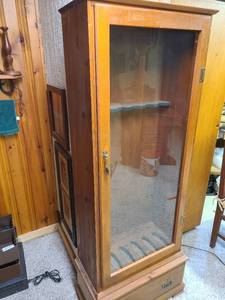 lot 2003 image: Gun cabinet 12x24x64. In basement.