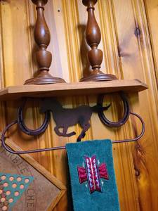lot 2007 image: Cowboy theme wall shelftowel rod 18 wide with two candle holders