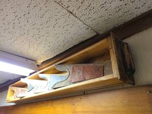 lot 2013 image: Wooden drawer 49 wide used to display boot jacks