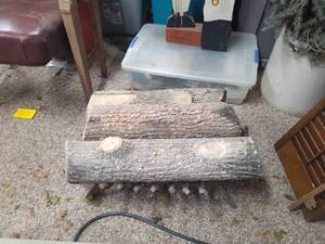 lot 3007 image: Fireplace accessories. Gas logs and grate. Approximately 23 inches long