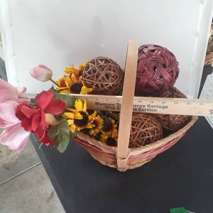 lot 3017 image: Home decor. Approximately 15 inch basket with wicker balls and faux flowers