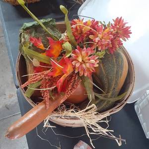 lot 3018 image: Fall decor. Approximately 16inch bushel basket with faux vegetables, gourds and flowers