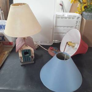 lot 3022 image: Lamps. One fastens to wall the other is a table lamp(16 tall) Comes with extra lamp shade