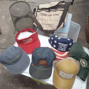 lot 3035 image: Fishing items and baseball caps and a visor