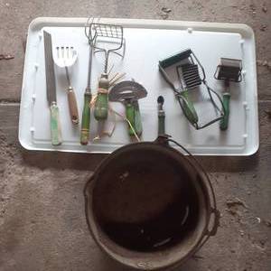 lot 3036 image: Vintage cast iron pot (bottom rusted out) with vintage kitchen utensils