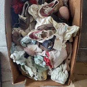 lot 3042 image: Box of vintage baby clothes or doll clothes and shoes