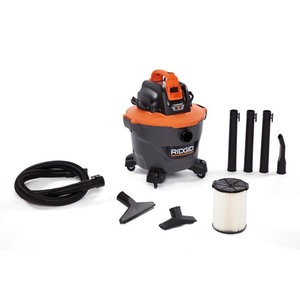 lot 24172 image: RIDGID - 9 Gal. 18-Volt Cordless NXT WetDry Shop Vacuum (Tool Only) with Filter Hose and Accessories, OrangesPeaches - Retail $89.00