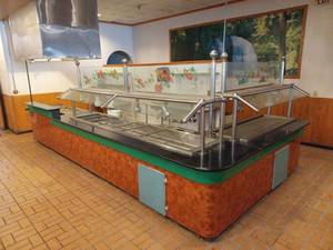 lot 117 image: Large L-Shaped Cold Food Serving Buffet Table wGlass Sneeze Guard (Longest Section 12 11) - (L Piece 6 6) Both are 3 Deep  6 ft Section Around Grill