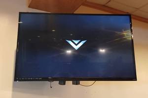 lot 127 image: VIZIO Model E500i-A0 LCD 50 TV wSwivel Wall Mounted Bracket - Is Mounted On Wall