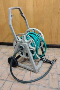 lot 234 image: Water Hose with Reel