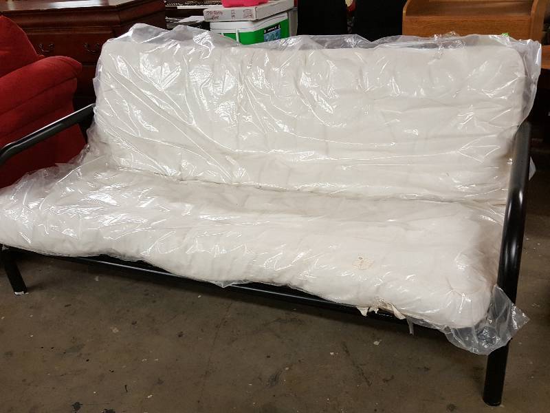 lot 1002 image: New 6 foot off White Futon ready for your living room or make shift bedroom does have the extra thick pad