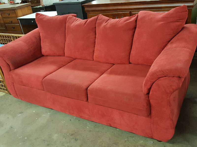 lot 1003 image: Plush looking Red couch with 4 pillows and made of Micro Fiber.