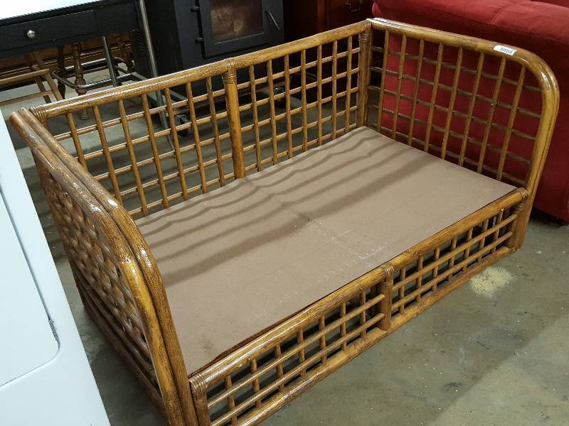 lot 1004 image: 53 Heavy Wicker weave Love Seat without the cushions