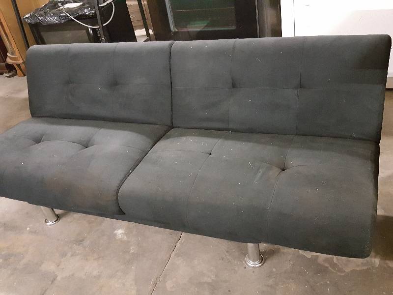 lot 1008 image: Black fold up down flat Futon made out of Micro Fiber and has chrome feet.  Get the vacuum out first.