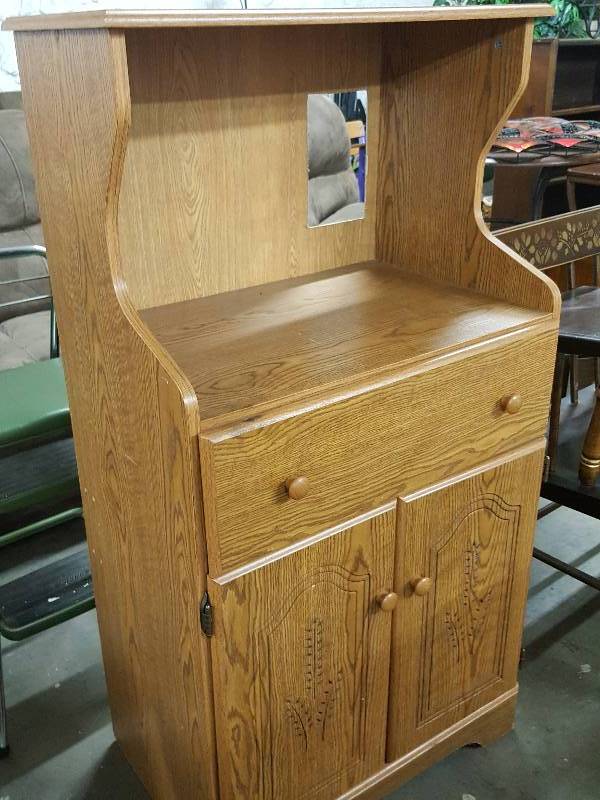 lot 1026 image: Cool old kitchen Micro wave stand alone table with storage underneath.  We need a little glue on the top drawer