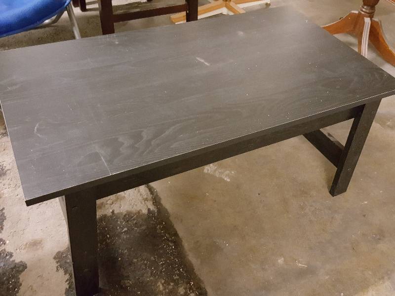 lot 1032 image: Sturdy all wood painted Black coffee table 35 X 19 X 16 off the floor