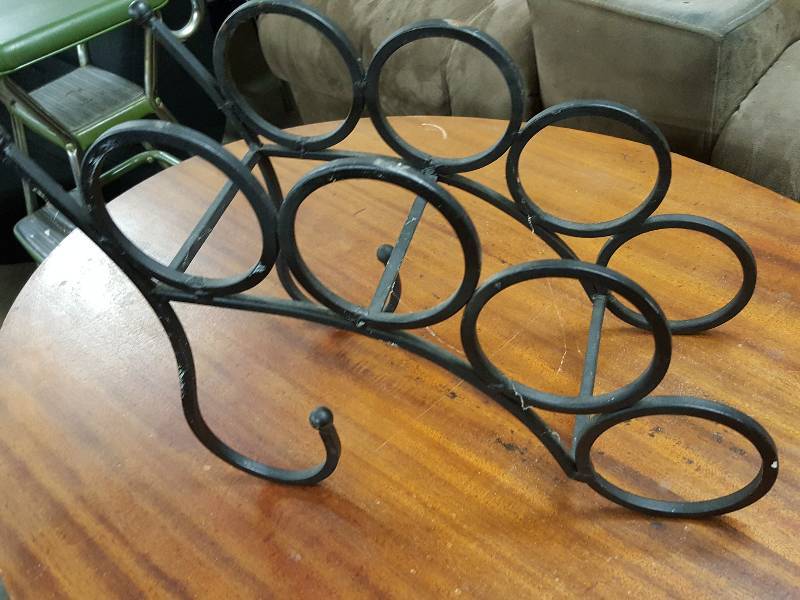 lot 1040 image: 4 position metal wrought iron design wine bottle rack