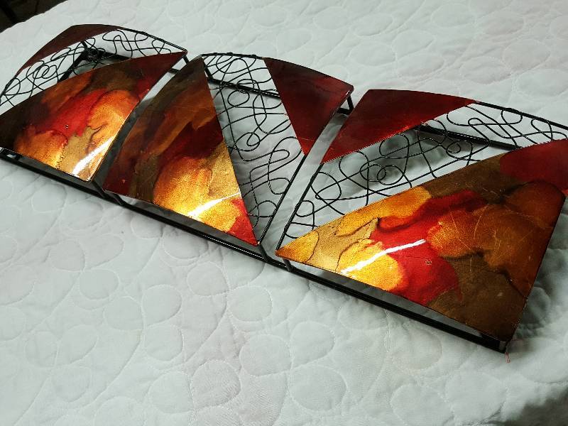 lot 1043 image: Decorative oriental looking metal wall art.  Pretty colors and with the ability to be hung vertical or horizontal