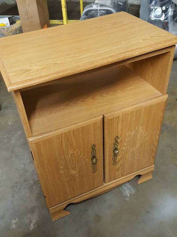 lot 1079 image: Real wood TV stand and storage cabinet with swivel top