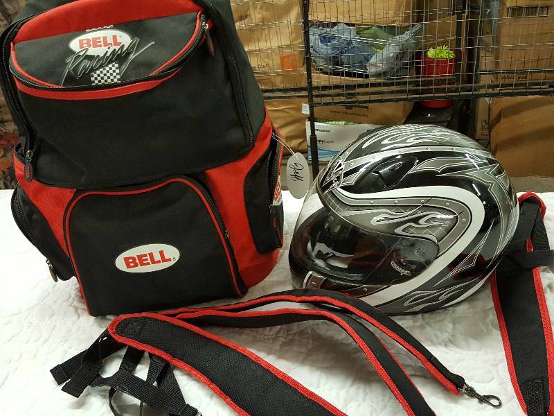 lot 1081 image: Bell Racers helmet storage bag with one helmet.  Wear as a back pack or carry with the straps.