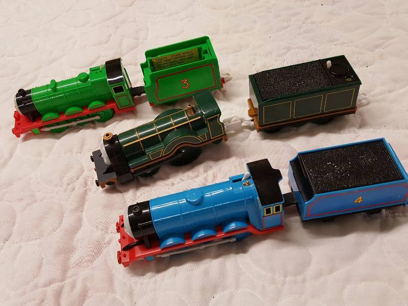 lot 1093 image: 3 Thomas the Train and his friends battery powered engines and coal cars.  None are tested and will most likely need batteries