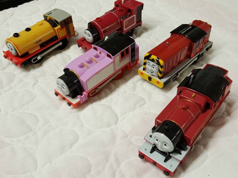 lot 1097 image: 5 Thomas the Train and his friends battery powered engines. None are tested and will most likely need batteries