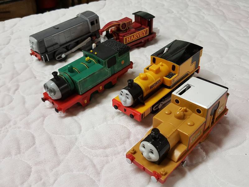 lot 1099 image: 5 Thomas the Train and his friends battery powered engines. None are tested and will most likely need batteries