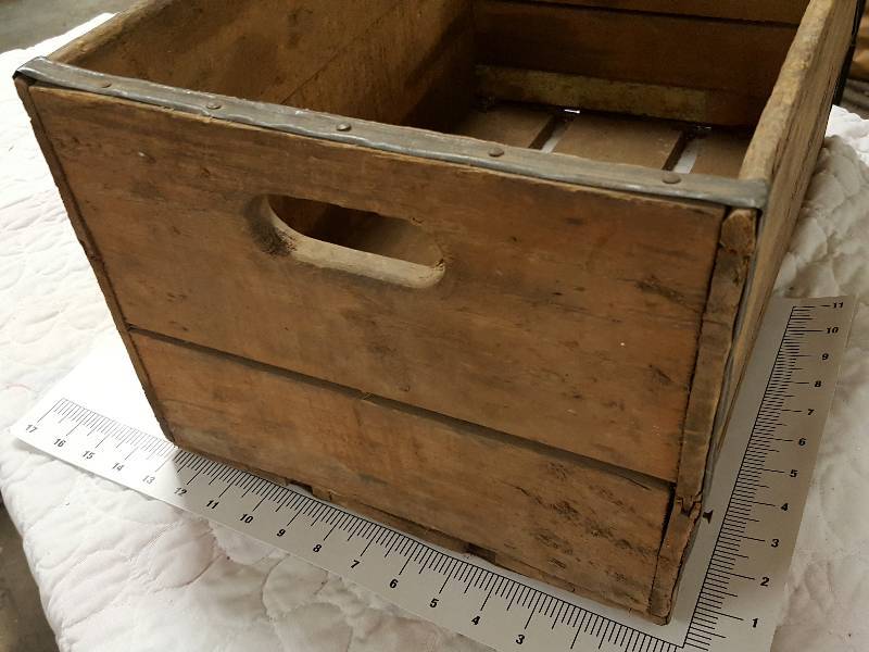 lot 1141 image: Blast from the past here with this Bordens Milk bottle wooden crate.  I hate this word but Im going to use it anyhow.