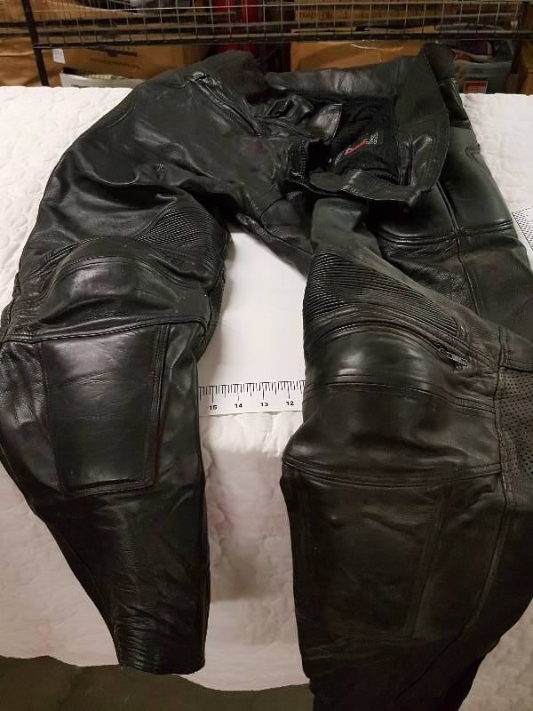 lot 1164 image: Just the pants.  Xpert leather motorcycle size 40 with good zippers and knee cap protectors vented.