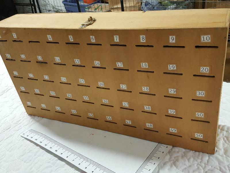 lot 1166 image: Silent auction ticket box with 50 slots for the bid tickets.  Supposed to be a tin can for every slot