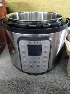 lot 52873 image: Instant Pot Duo 7-in-1 Electric Pressure Cooker, Slow Cooker, Rice Cooker, Steamer, Saut�, Yogurt Maker, Warmer & Sterilizer, Includes Free App with over 1900 Recipes, Stainless Steel, 6 Quart dented