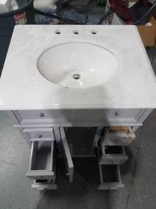 lot 9848 image: Bathroom vanity  gray with cracked top