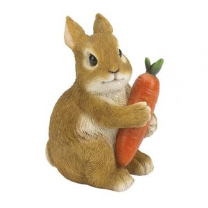 lot 9901 image: Rabbit Hugging Carrot Garden Figurine