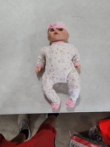 lot 1818 image: Lil Baby Doll With Blue Eyes