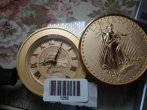 lot 1252 image: Bulova Quartz Walking Liberty Coin Clock