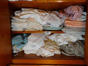 lot 1281 image: All Linens and Sheets on Bottom and Middle Shelf