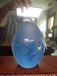 lot 1288 image: Blue Glass Egg Shaped Paper Weight - Arthur Court - Dancing Bunnies