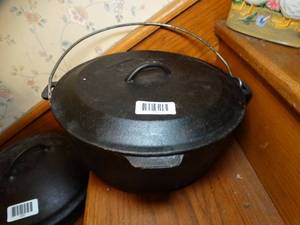 lot 1419 image: 2 Lidded Cast Iron Cooking Pans