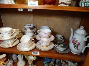 lot 1508 image: Shelf of Collectible English Tea Cups and Saucers & 1 Floral Pitcher