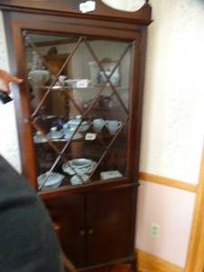 lot 1512 image: Dark Wood Glass Front 6Ft Tall Corner Cabinet