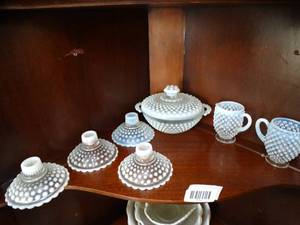 lot 1514 image: Beautiful Moon Glass Hobnail  Candle Sticks  Lidded Dish  Creamers  Contents on Middle Shelf