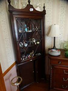 lot 1568 image: Dark Wood Glass Front 6Ft Tall Corner Cabinet