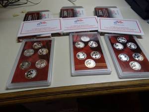 lot 1643 image: (3)   2009 U.S. Mint Silver Quarter Proof Sets w Box & COA
