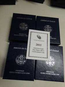 lot 1652 image: (4) - 2011 U.S. Mint  American Eagle One Ounce Uncirculated Silver Coin w Box and COA